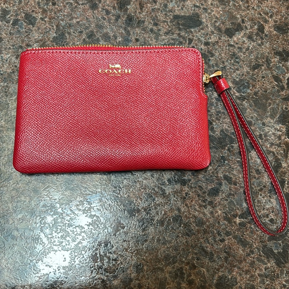 Like new coach wristlets!